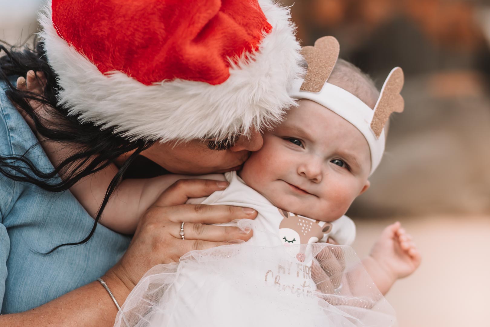 Authentic Australian summer vibes during a Christmas beach photoshoot for families in North West Tasmania, featuring joyful, relaxed moments.
